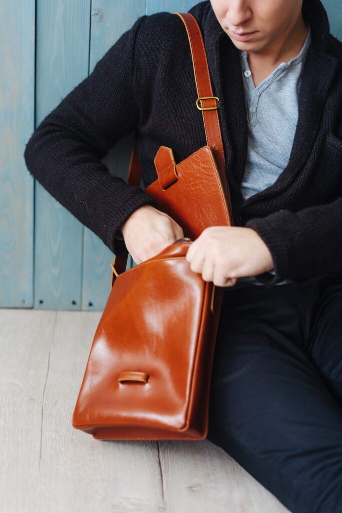 handsome guy with leather bag YXUVNZK 1
